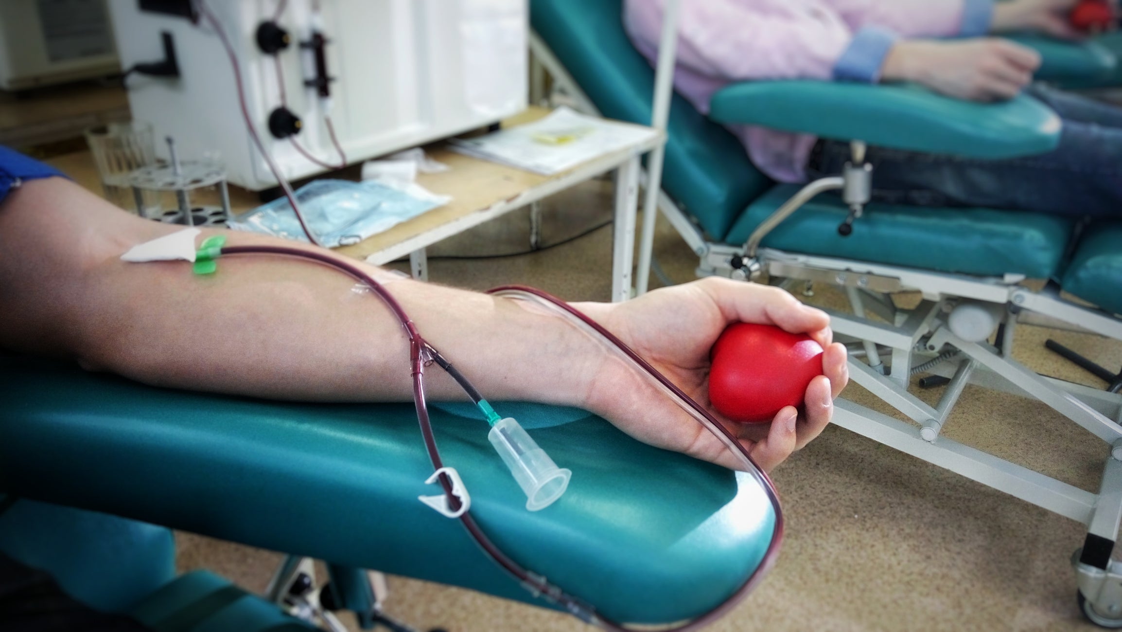 A person donates blood.