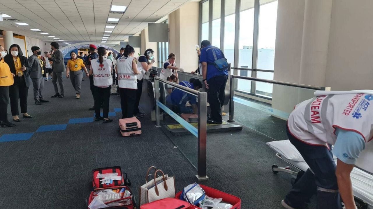 medical staff surrounding walkway