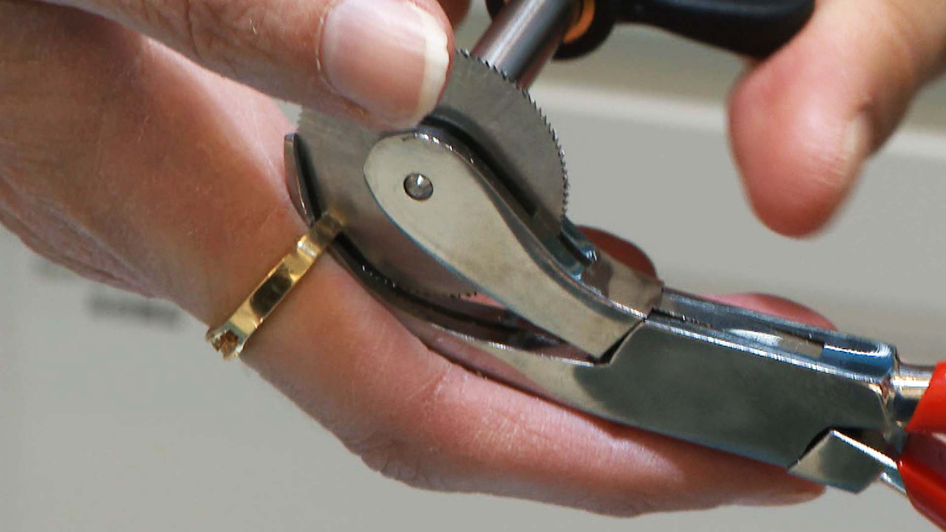 Ring being cut off of someone's finger