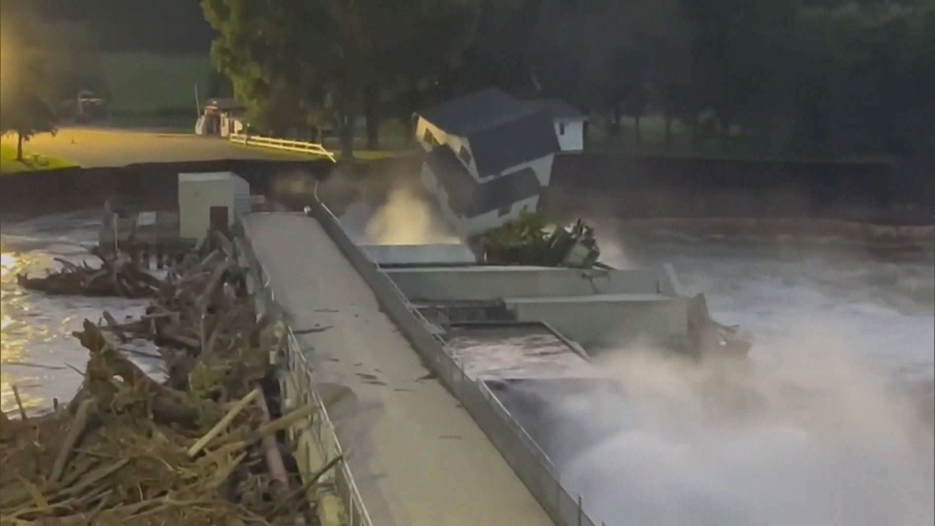House Falls Into River After Rapidan Dam Collapses