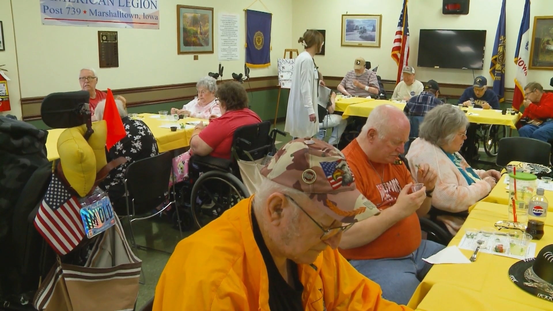 Residents at the Iowa Veterans Home meet with a dietician to try new foods and reminisce.