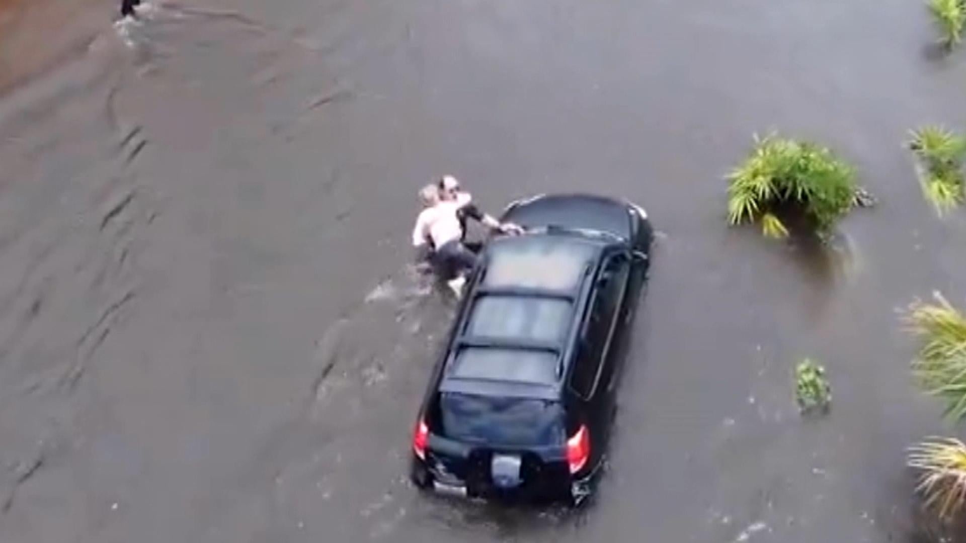 Woman Trapped in SUV Is Saved During Tropical Storm Debby