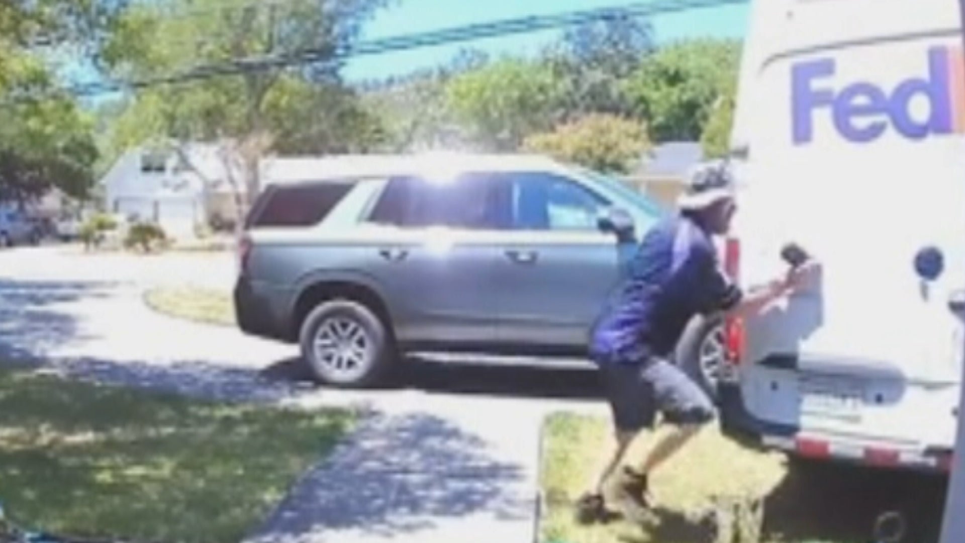 FedEx Driver Tries to Stop Runaway Van 