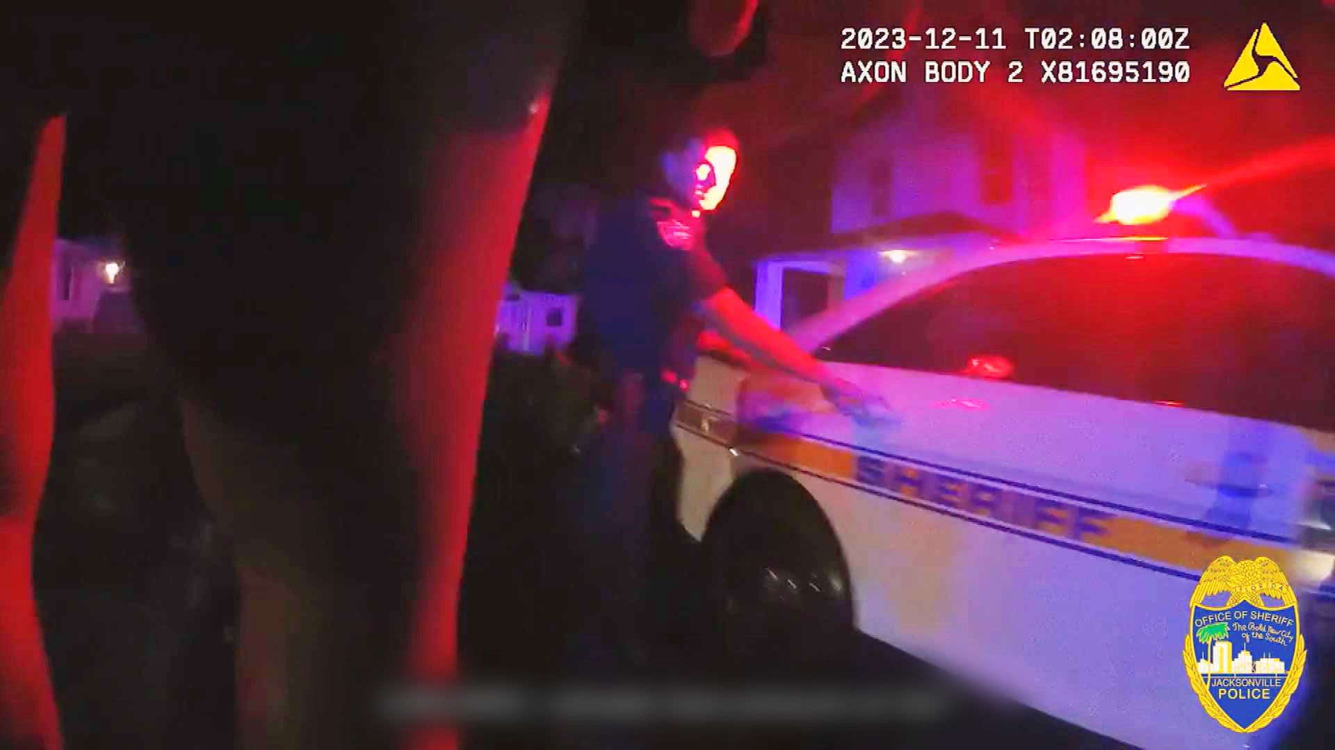 “Florida officer opening car door”