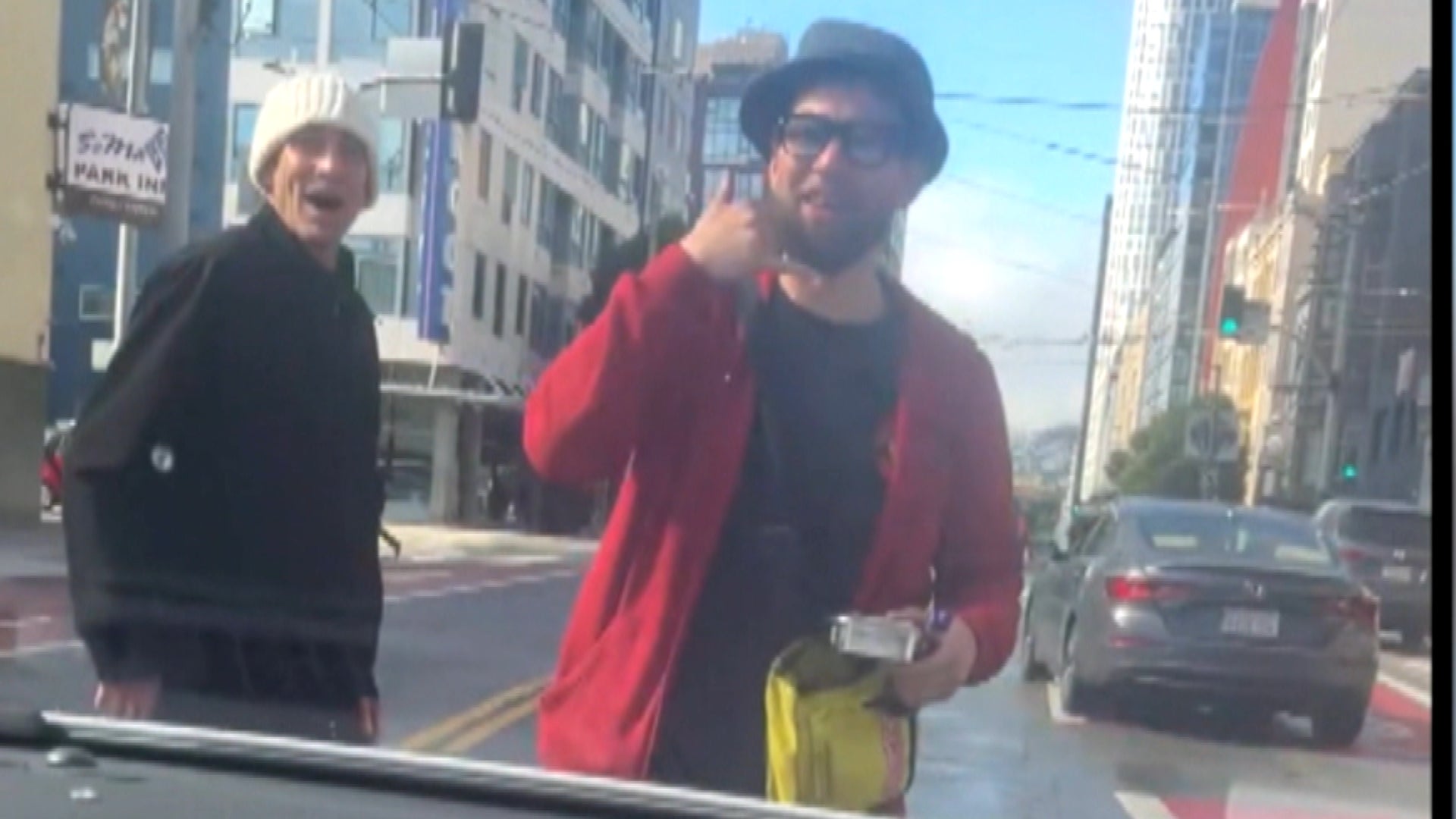 Man blocking Waymo car