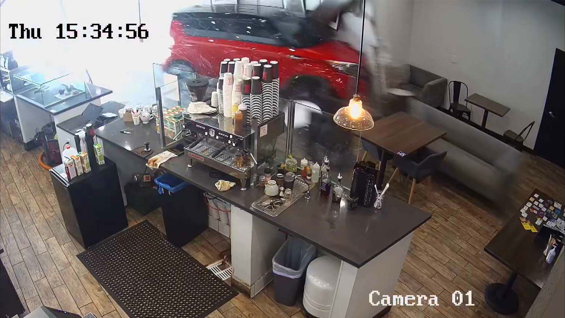 car crashing into coffee shop