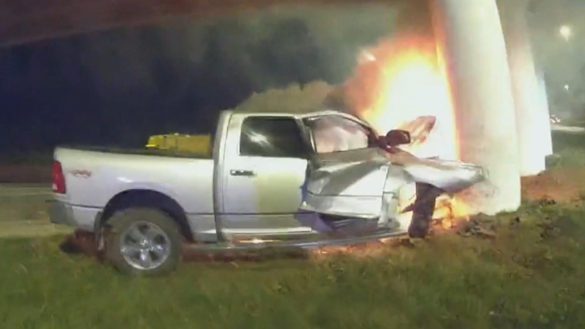 Police Officer Pulls Man Out of Burning Pick-Up Truck