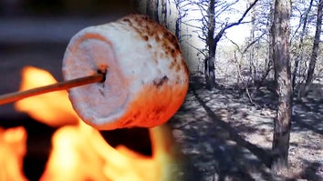 marshmallow roasting on a fire / burned land