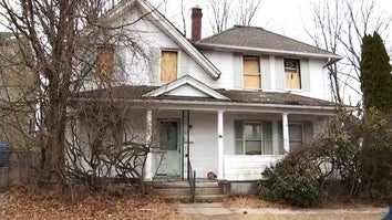 House with boarded windows