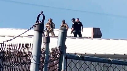 Secret service agents on rooftop