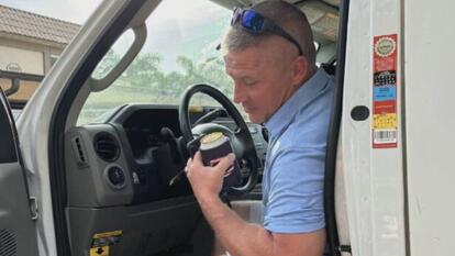 David Whalen in driver's seat of U-Haul truck