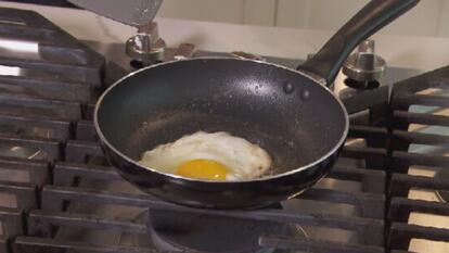 egg in black non-stick pan 