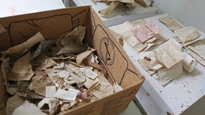 Scraps of paper in a box