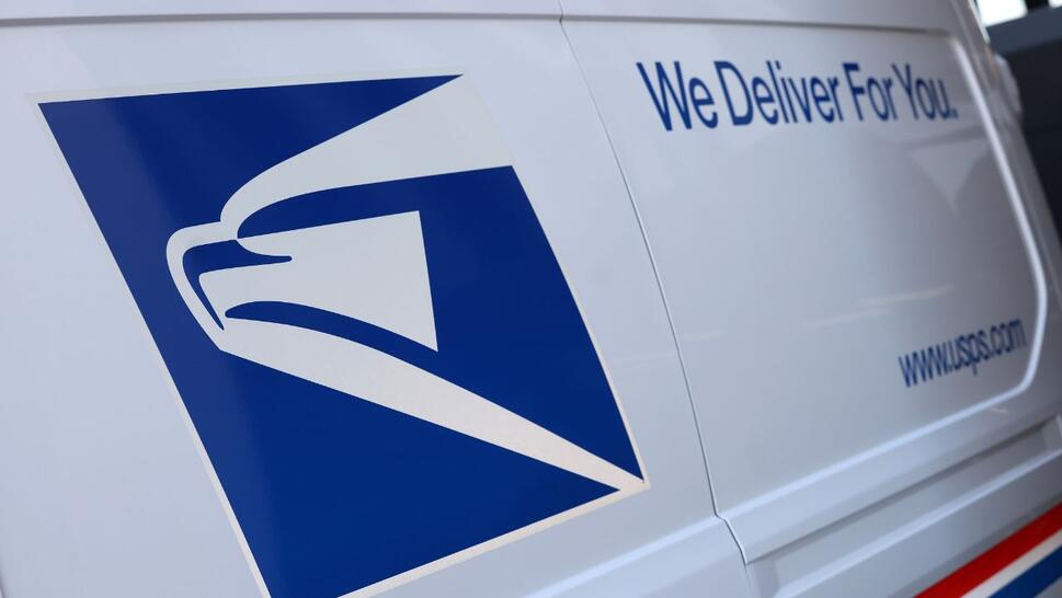 van with USPS logo