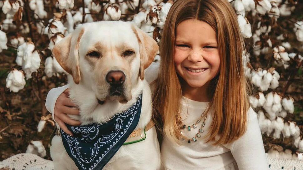 Girl and her diabetes service dog