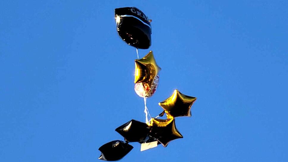 Graduate Hopes Balloons That Blew Away Will Be Returned