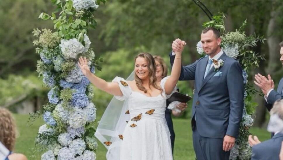 monarch butterflies on Amy Rose Perry's wedding Dress