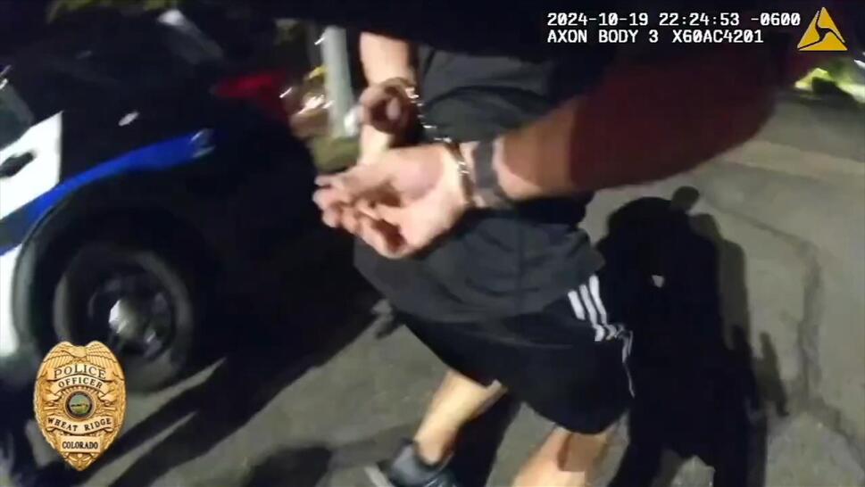 A DUI suspect in handcuffs attempted to run from Colorado police officers.