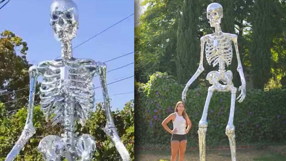 disco skeleton / Ali Spagnola next to giant skeleton