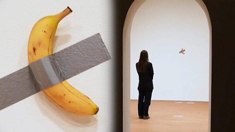 Banana taped to wall, Woman observing banana taped to wall