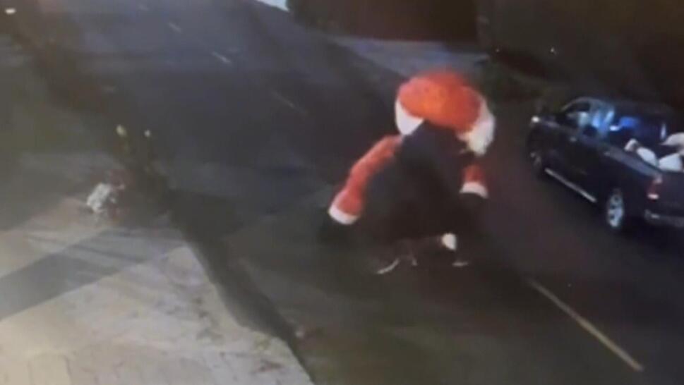 Surveillance Video Shows Thief Stealing Inflatable Santa 